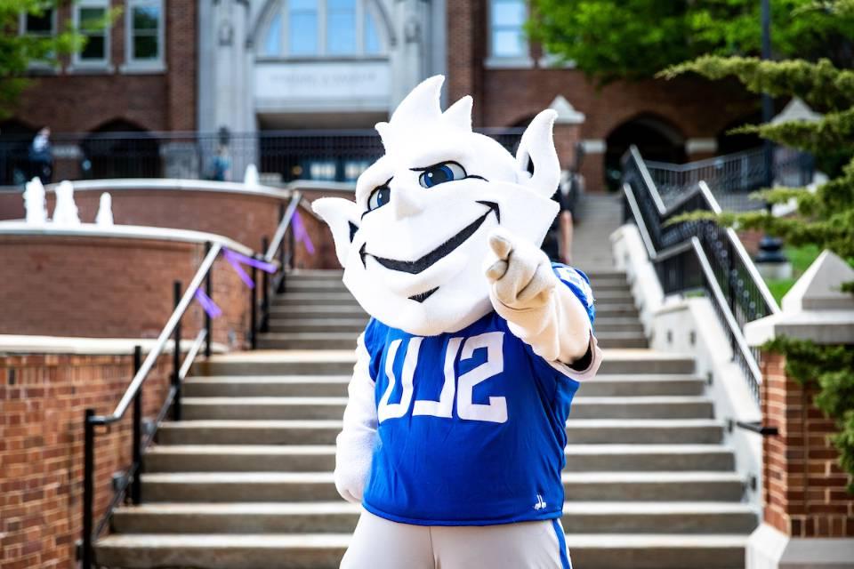 The Billiken in front of Cook Hall.