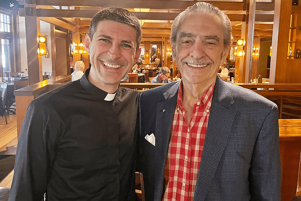 Al Hrubetz and Fr. Matthew Baugh stand side-by-side to pose for a photo.