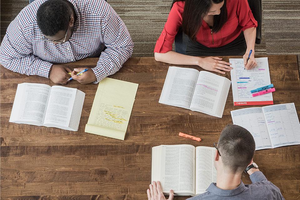 Students studying in Vincent C. Immel Law Library.