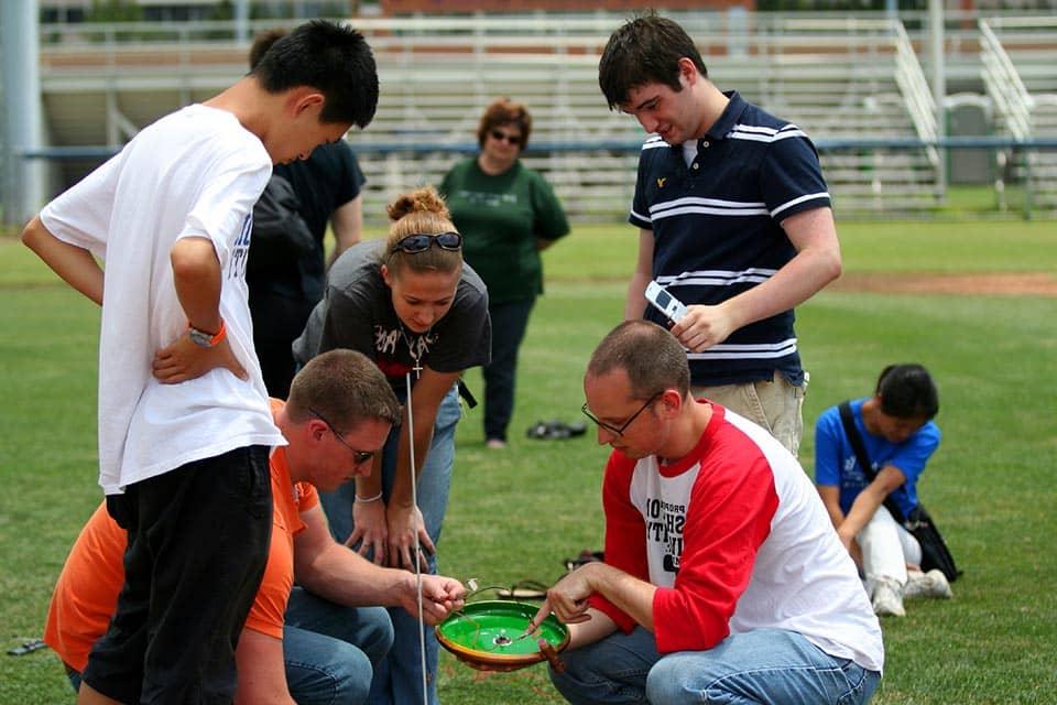 Sullivan and her teammates work on the "frocket," a flat circular device